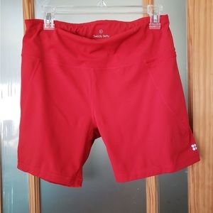 Sweaty Betty 6” red power shorts